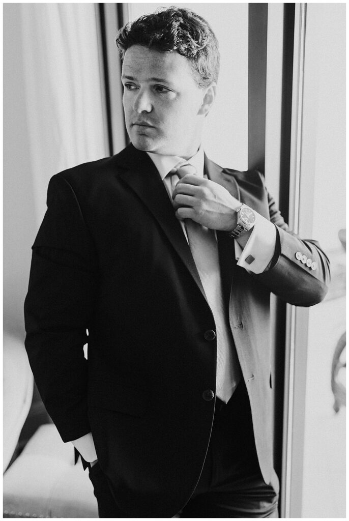 black and white portrait of groom