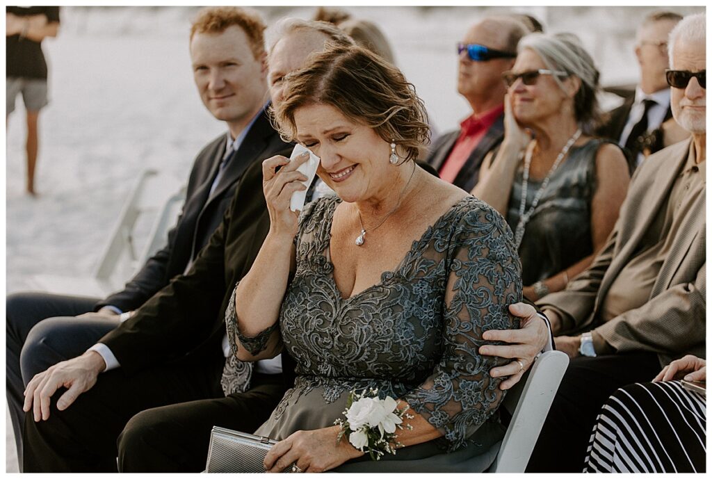 mother of groom crying