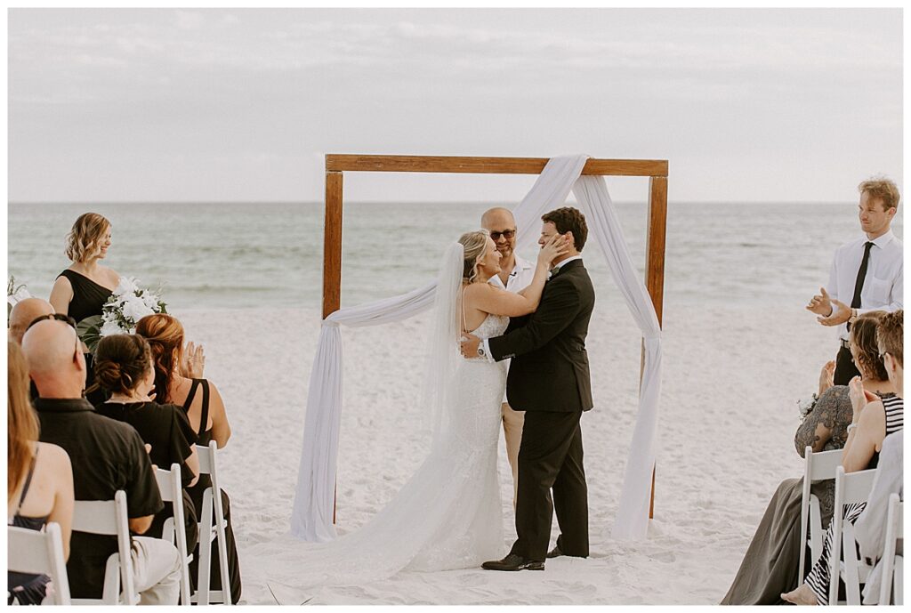 bride wipes grooms tears