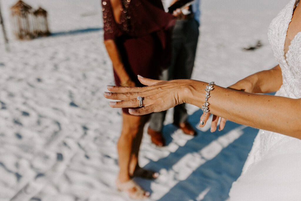 Closeup of bride's hand with wedding ring
