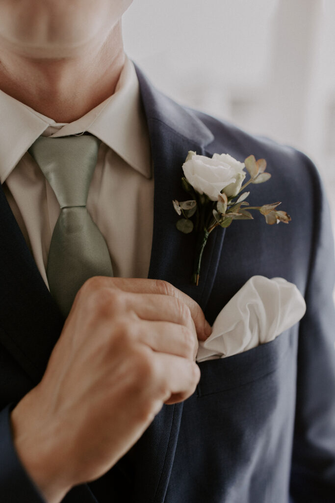 close up of groom details