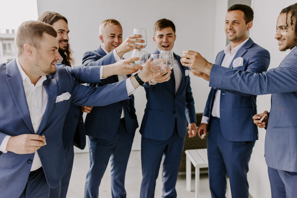 groomsmen toasting