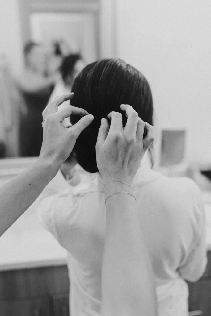 bride getting hair done