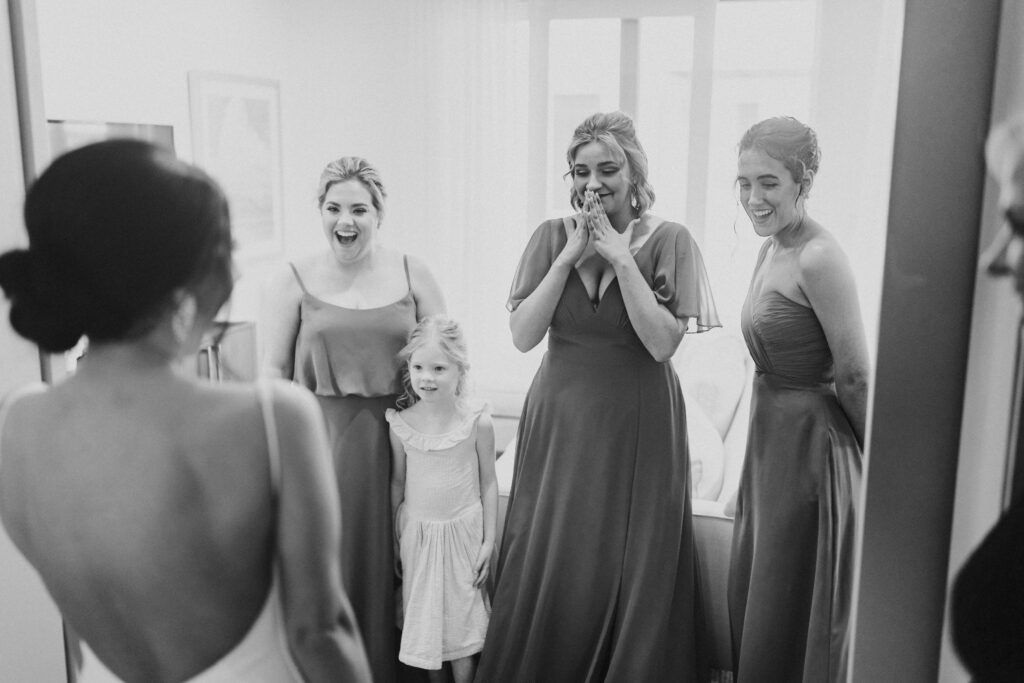 Bridesmaids seeing bride for the first time