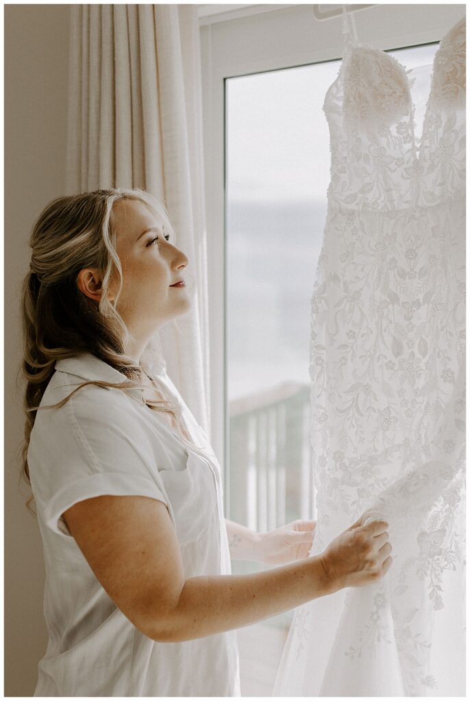 Bride looking at dress