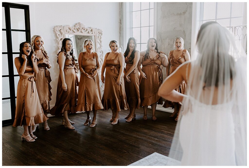 Bridesmaids seeing bride for the first time