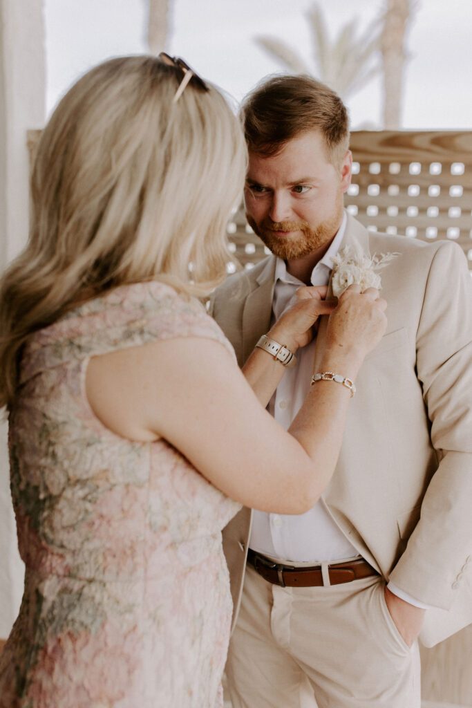 Mother of groom pin on boutonniere