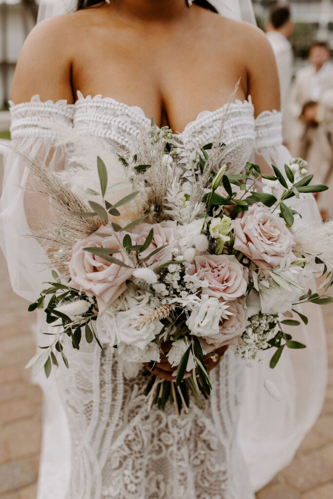 closeup of bride holding bouquet