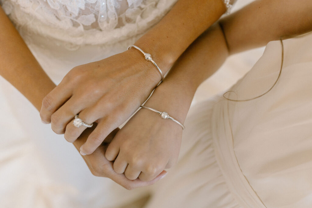 Bride and daughters matching bracelets