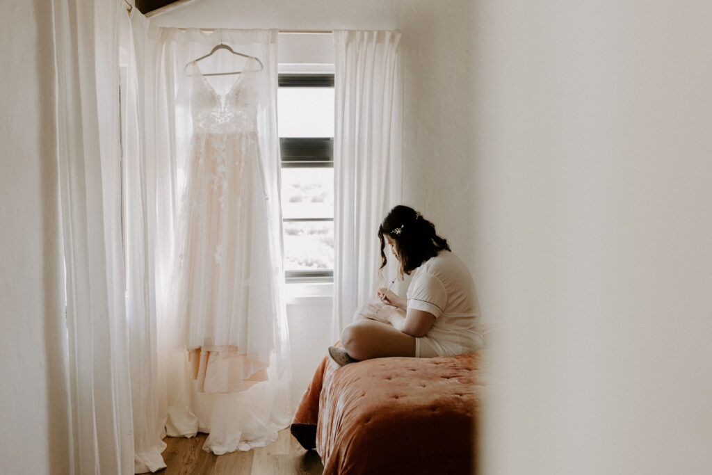 Bride writing her vows at her st augustine elopement