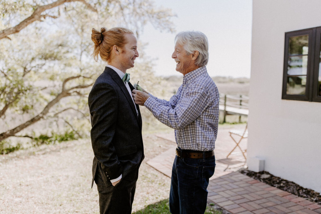 Groom getting ready with his dad