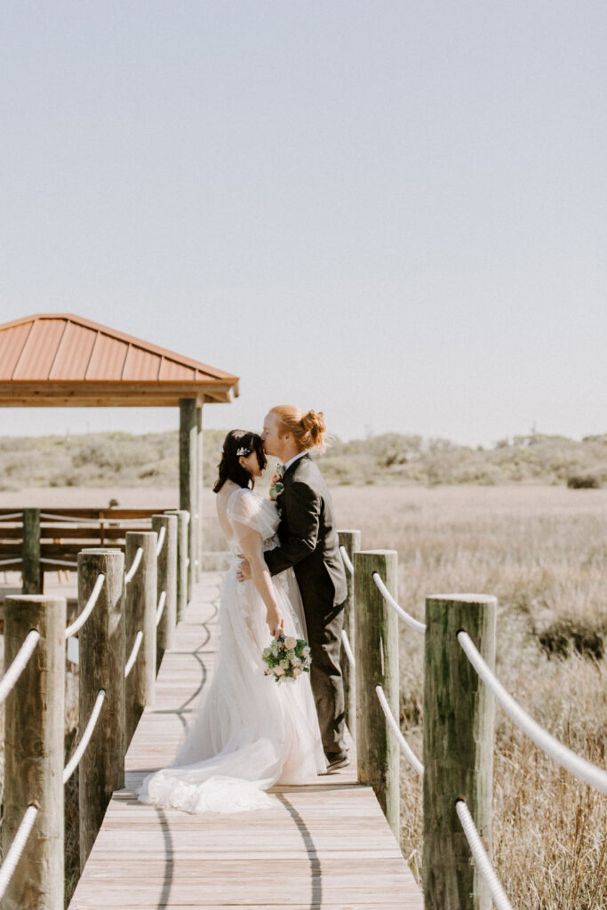 Couple kissing at the end of their ceremony