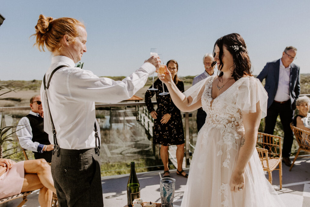 Couple toasting at their wedding reception