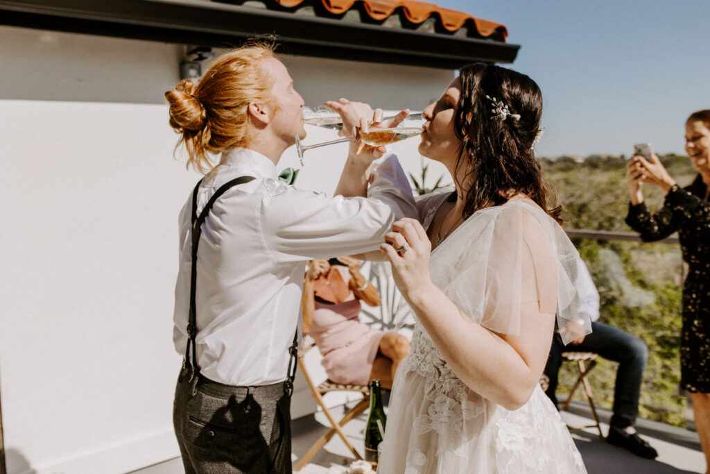 Couple toasting at their wedding reception